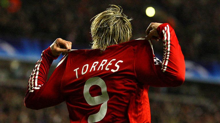 16th minute: Fernando Torres celebrates after stabbing home Liverpools opener.