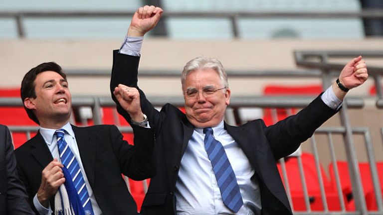 Bill Kenwright celebrates victory.