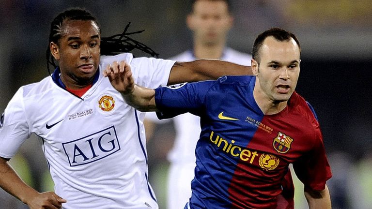 Iniesta uses his pace and skill to cut through Man United.