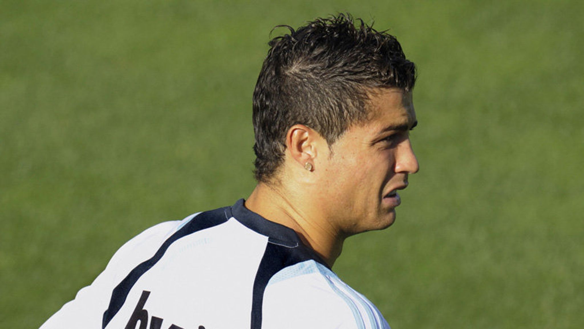 Cristiano Ronaldo of Real Madrid scratches his head during the