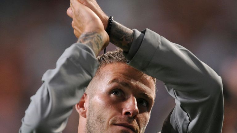 David Beckham applauds the England supporters after the final whistle.