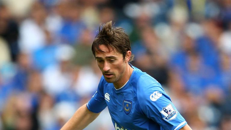 New Portsmouth signing Tommy Smith makes his debut against Manchester City at Fratton Park.