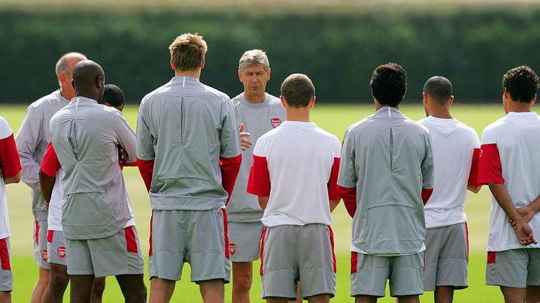 Manager Arsene Wenger talks to the players during an Arsenal training session prior to Tuesdays Champions League fixture against Celtic at London Colney training ground on August 17 2009 in St Albans.