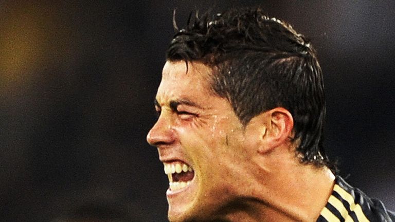 Cristiano Ronaldo celebrates after scoring a trademark free-kick against FC Zurich.