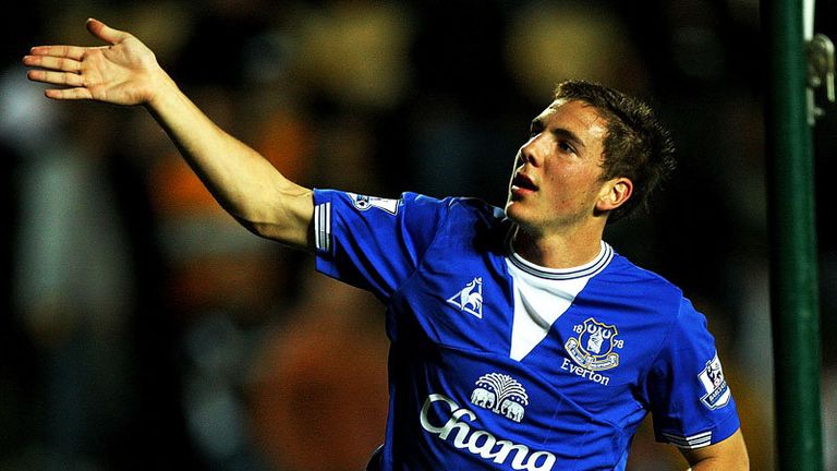 Dan Gosling celebrates scoring the third goal for Everton.