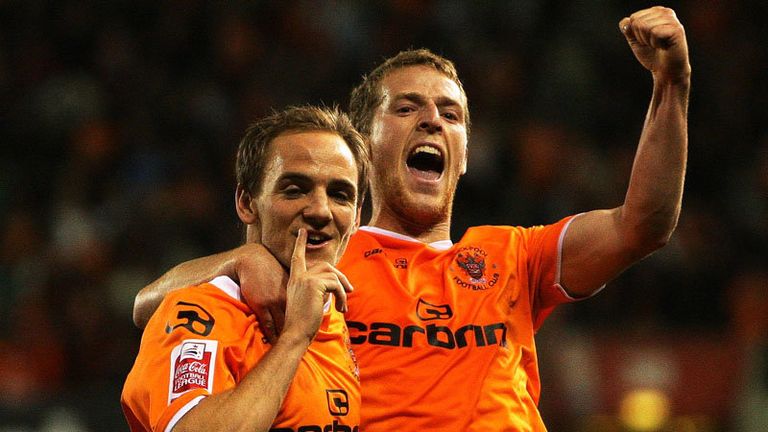 David Vaughan celebrates a 25-yard screamer that puts Blackpool in front.