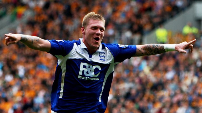 The Scottish forward celebrates opening his Premier League account for this term.