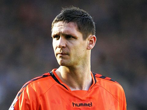 Image of Wilkie: Hangs up boots