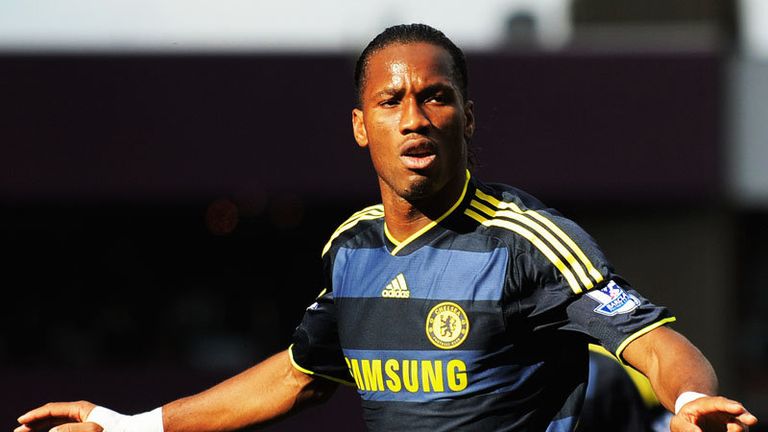 Drogba celebrates putting Chelsea in front with a 30-yard shot