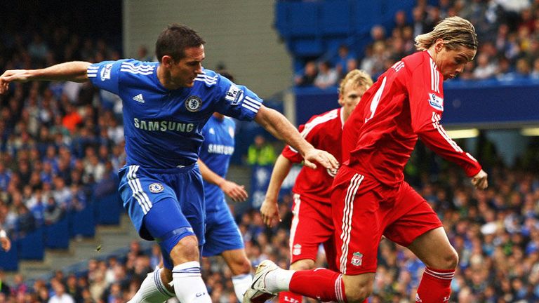 Fernando Torres and Frank Lampard battle for possession at Stamford Bridge
