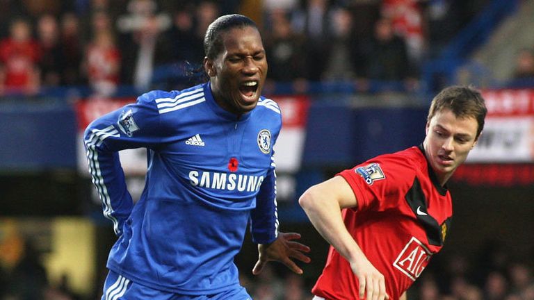 Didier Drogba suffers a painful knock in the back