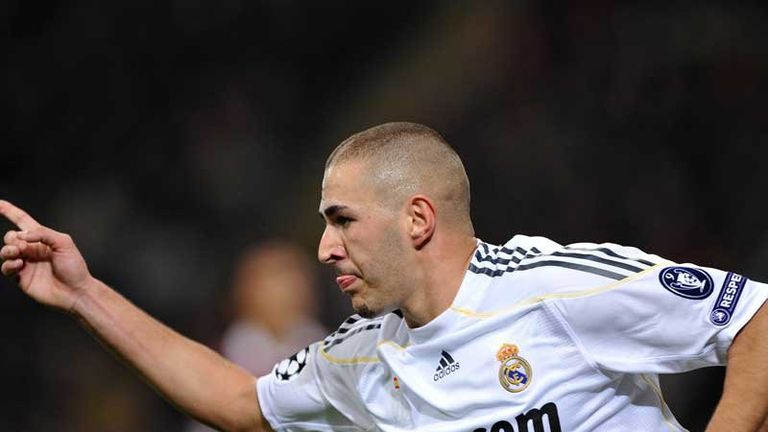 Karim Benzema gives Real Madrid the lead against AC Milan in the San Siro