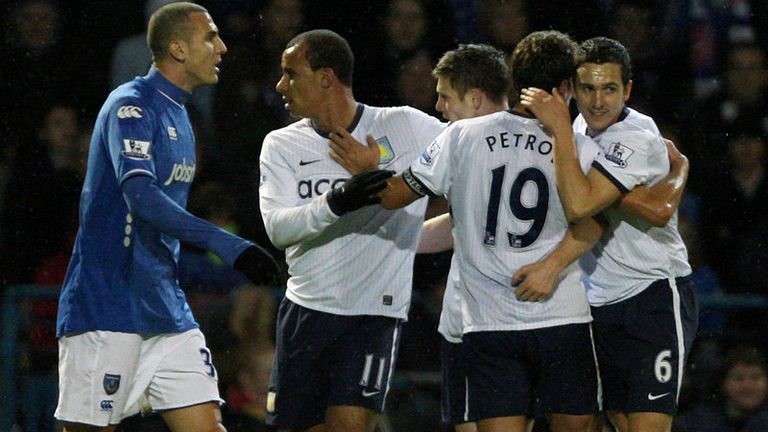 celebrating in their Carling Cup clash with Portsmouth