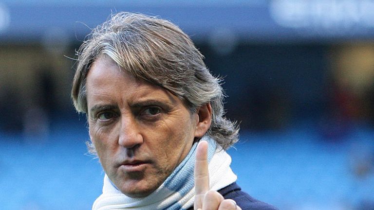 Roberto Mancini takes charge of his first game for Manchester City