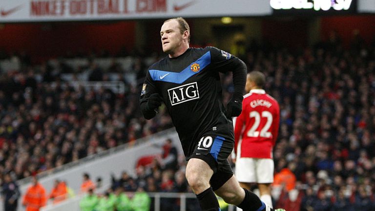 Wayne Rooney celebrates scoring his 100th Premier League goal