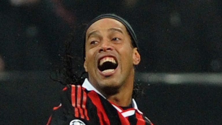 Ronaldinho celebrates opening the scoring at the San Siro