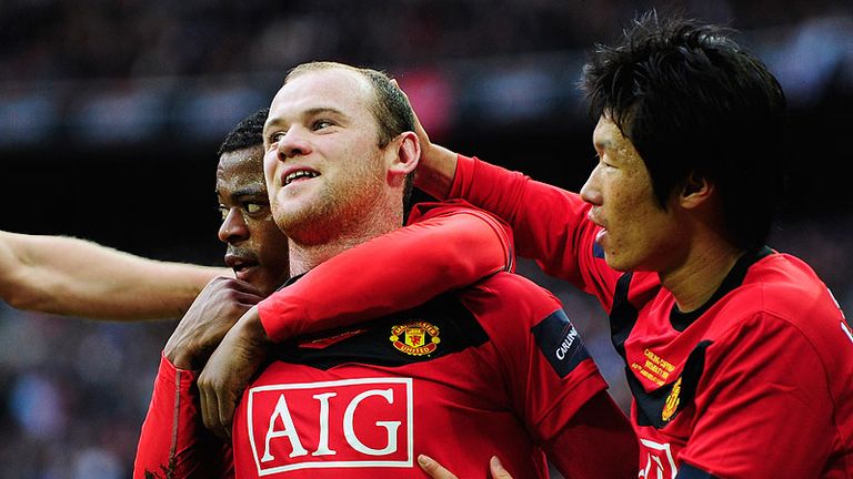 Wayne Rooney celebrates scoring the second goal for Manchester United