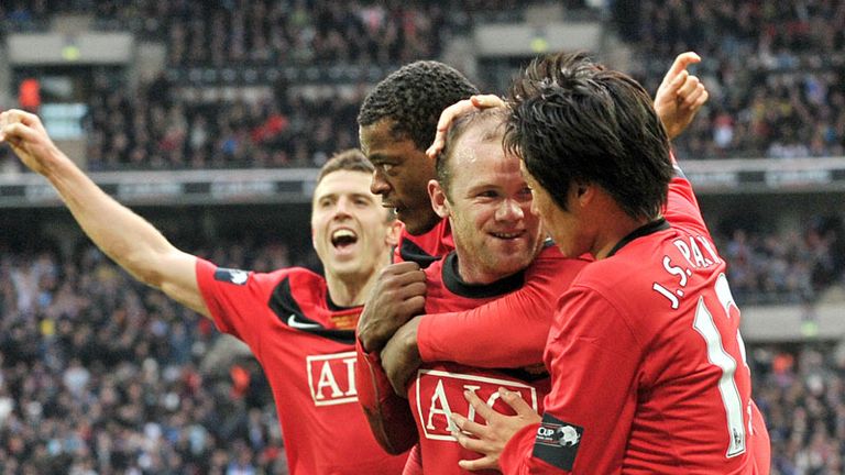 Wayne Rooney celebrates scoring the winner in the Carling Cup final