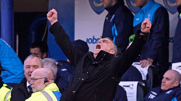 Grant celebrates a 2-0 victory at the full-time whistle 
