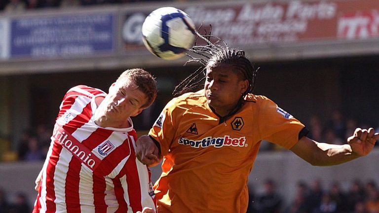 Michael Mancienne challenges for the ball with Robert Huth