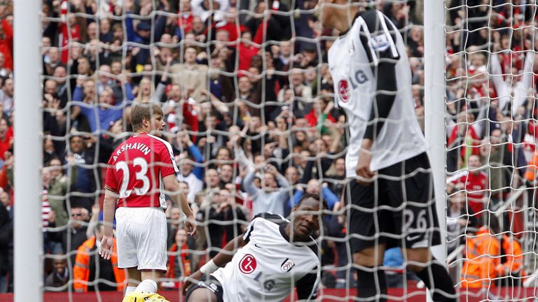 Andrey Arshavin squeezes the ball home from a tight angle