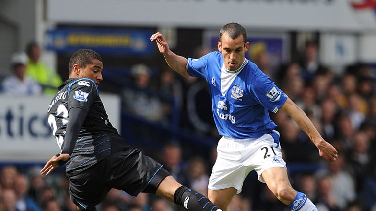 It's mine: Kevin Prince Boateng and Leon Osman compete at Goodison Park