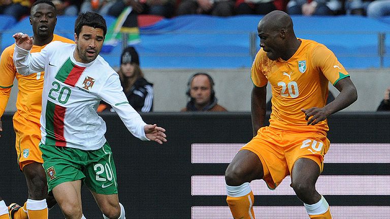 Deco tries to find a way through the Ivory Coast defence