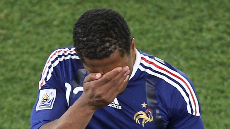 Patrice Evra is downcast after a shock defeat