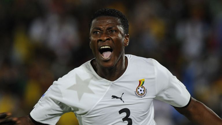 Asamoah Gyan wheels away in delight after opening the scoring.