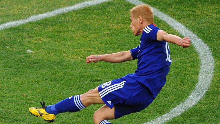 Japan go close with a shot from Keisuke Honda