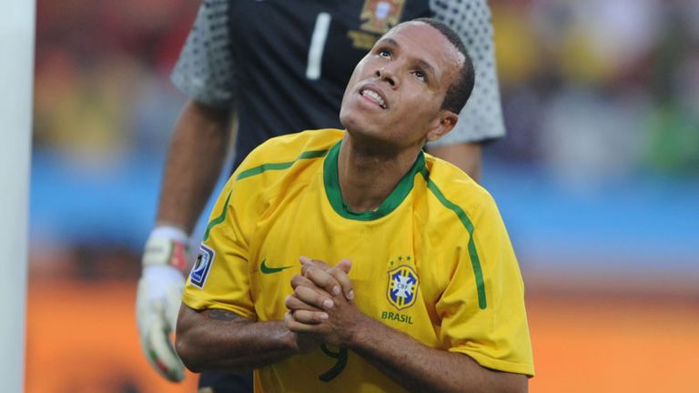 Please help: Brazil striker Luis Fabiano appeals for Divine help during his sides clash with Portugal.