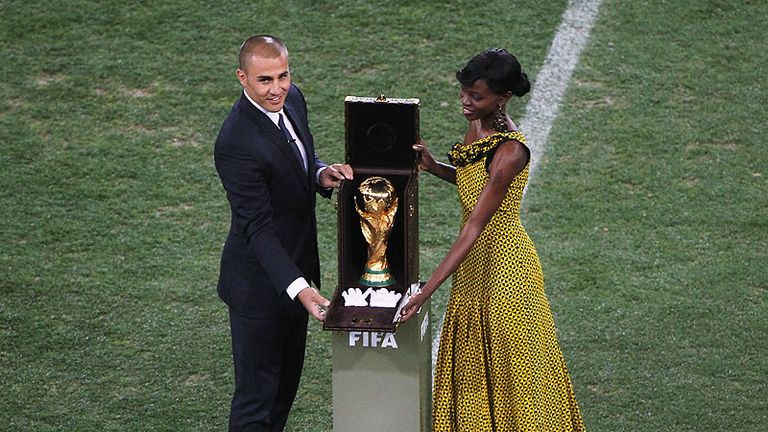 Fabio Cannavaro presents the World Cup trophy before the final