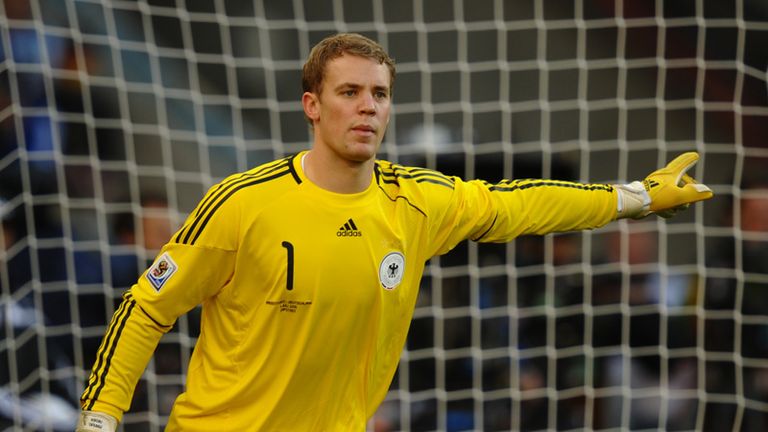 Germany goalkeeper Manuel Neuer lines up his wall