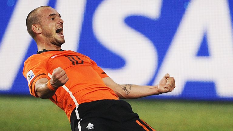 Wesley Sneijder celebrates scoring the winning goal for Holland