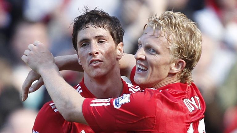 Fernando Torres and Dirk Kuyt celebrate after opening the scoring.