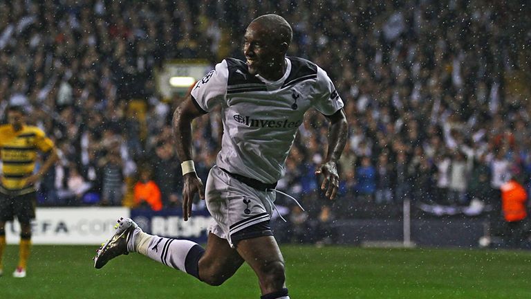 Defoe checks with the referee before celebrating his goal