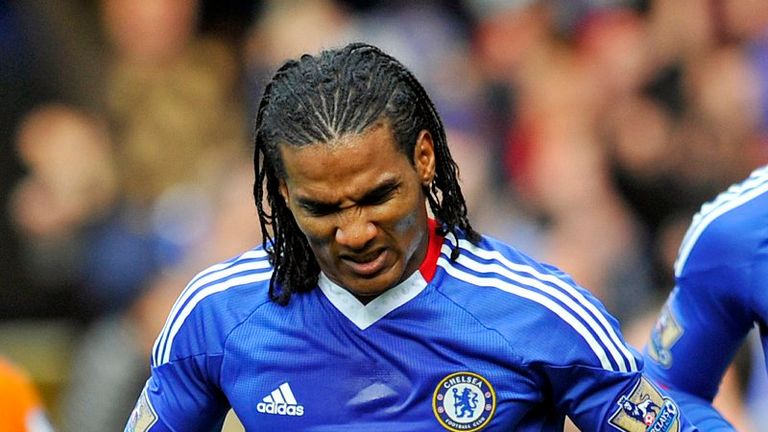 Florent Malouda celebrates putting Chelsea in front after capping off a well-worked move.