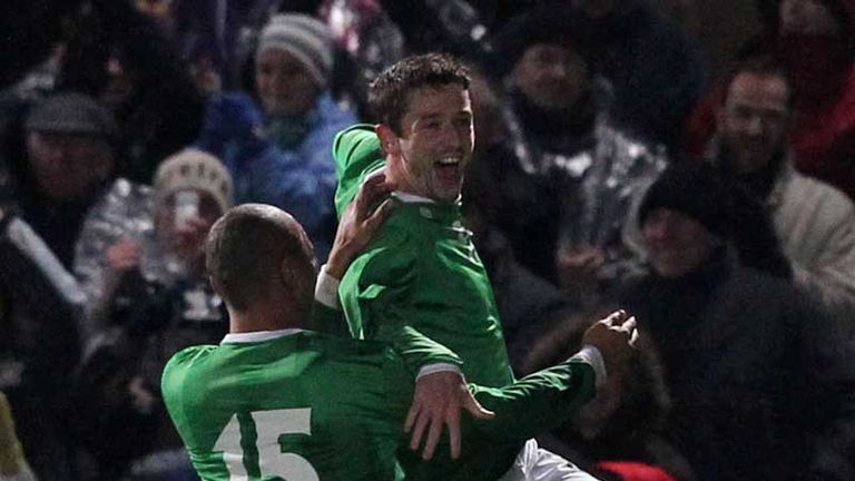 Rory Patterson celebrates his first international goal after slotting home from the spot.