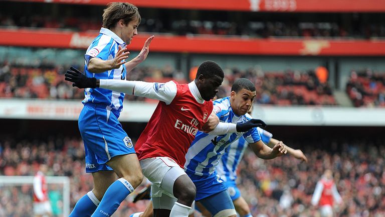 Spirited: The Terriers defence tackle Eboue