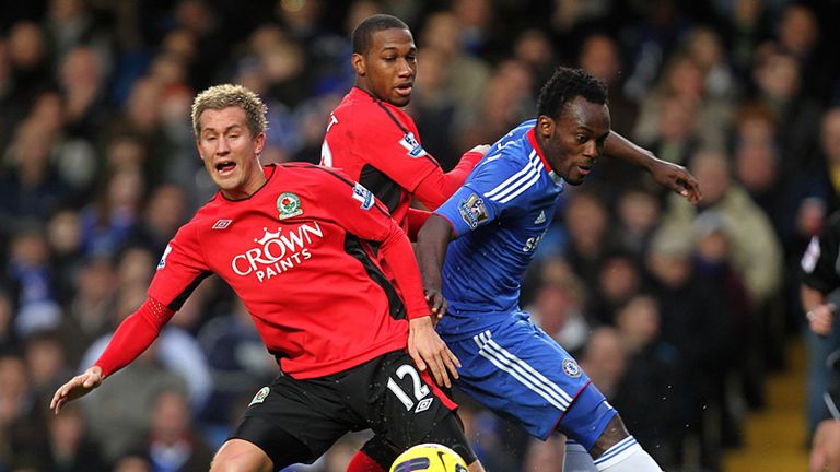Morten Gamst Pedersen tussles with Michael Essien