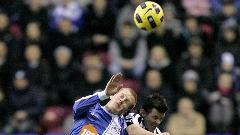 Midfield battle: Watson and Barton challenge for the ball