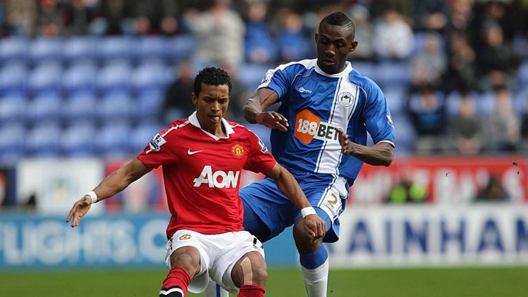 Challenge: Nani shields the ball away from Gohouri