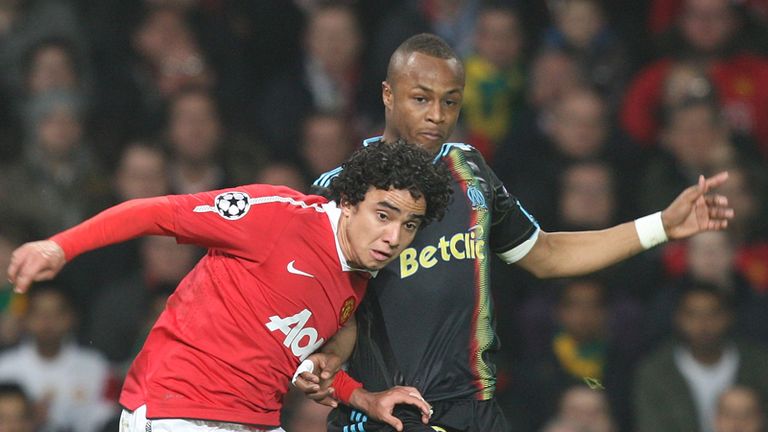 Manchester Uniteds Rafael challenges for the ball.