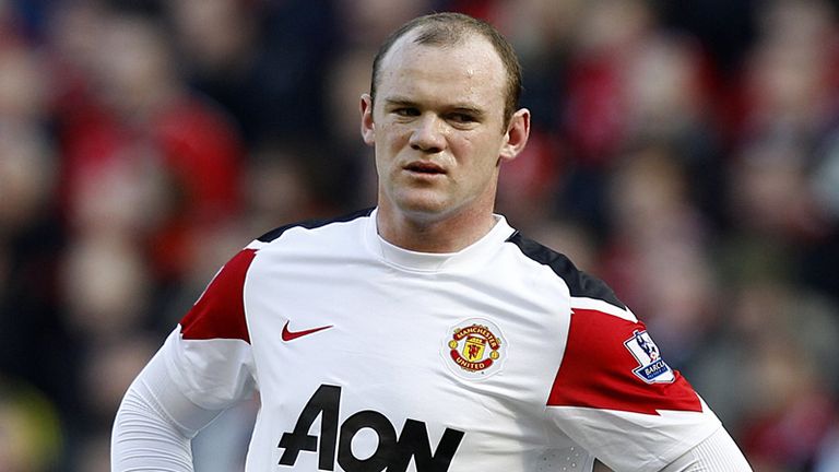 Wayne Rooney stands dejected