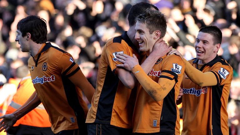 Wolves celebrate after Doyle scores a penalty
