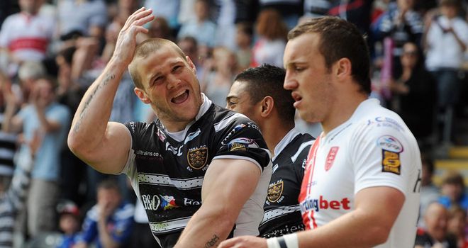 Kirk Yeaman celebrates after scoring one of his brace of tries against Hull KR