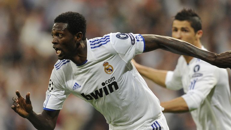 Emmanuel Adebayor reels away in celebration after scoring against Tottenham.