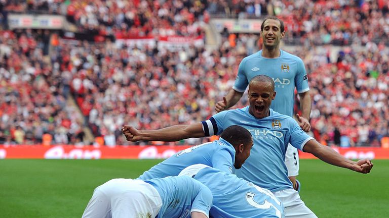 Celebrations: City are jubilant after Toure's winner