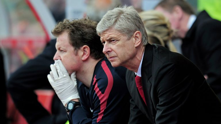 Arsene Wenger watches from the touchline