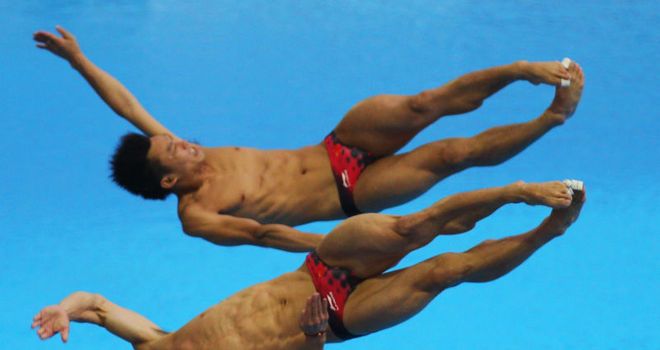 Qin Kai and Luo Yutong kept China on course for a diving clean sweep